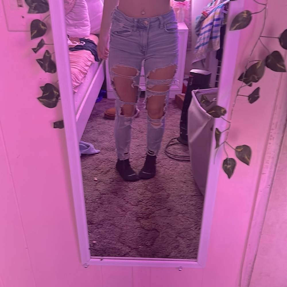 Light blue ripped American eagle skinny jeans